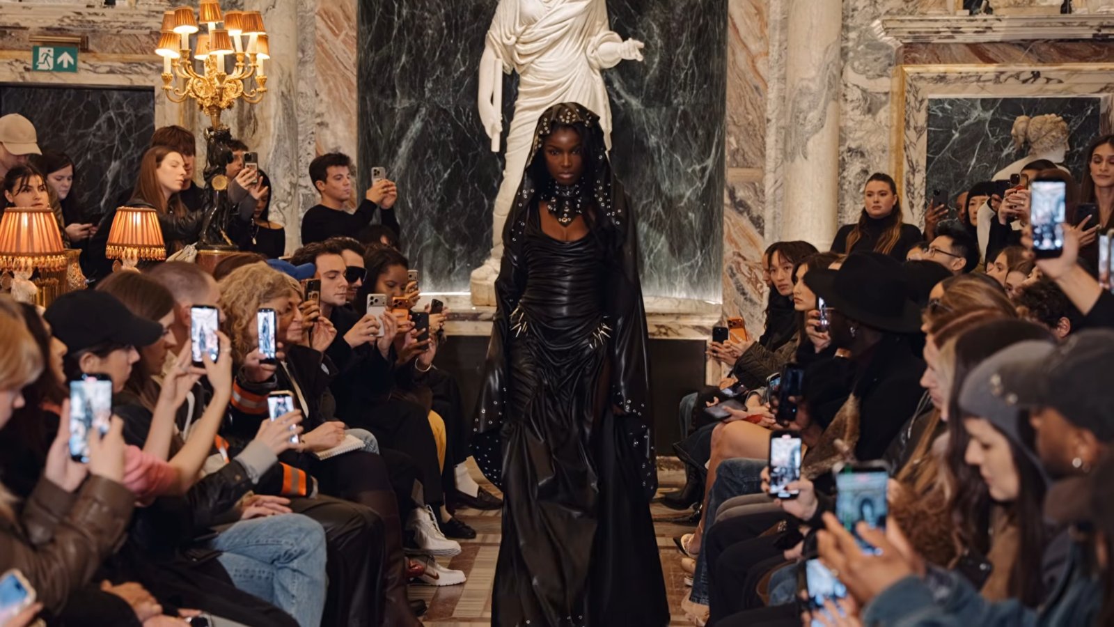 Leomie Anderson closed the show in a leather wetlook dress.