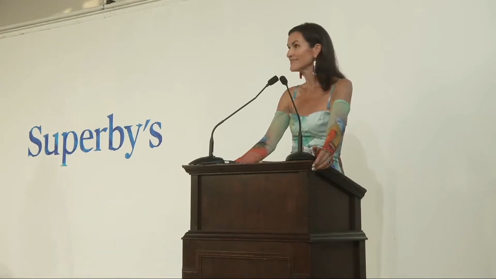 The show was a real live auction, run by Christie’s auctioneer Lydia Fenet under a fake auction house called “Superby’s.” Every guest got a numbered paddle.