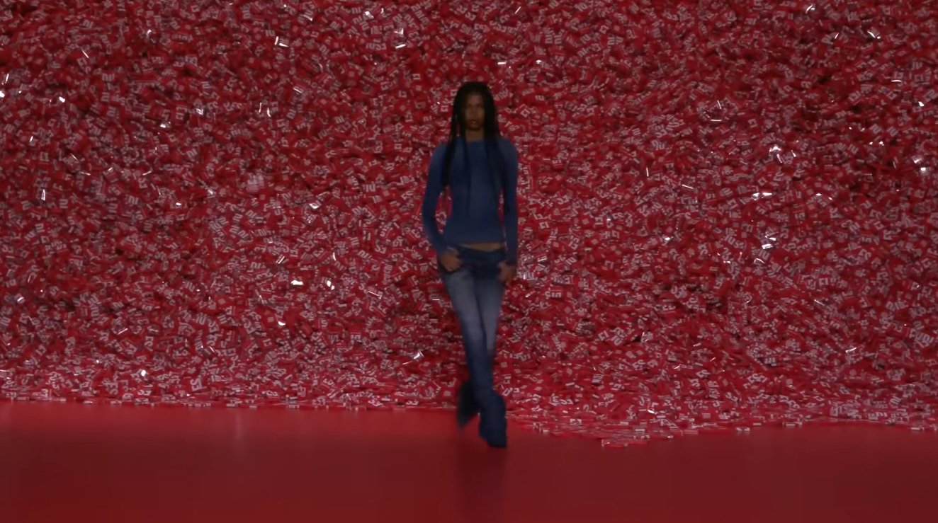 The opening look was a callback to McQueen's "bumster" pants