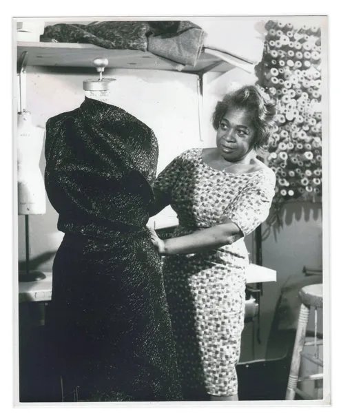 What iconic, skin-baring uniform was designer Zelda Wynn Valdes credited with creating in the early 1960s?