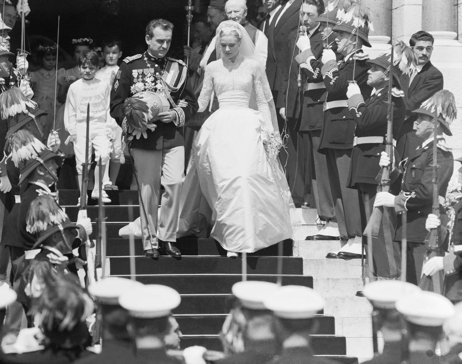 Grace Kelly’s wedding dress for her 1956 marriage to Prince Rainier III of Monaco was a gift from which Hollywood film studio?