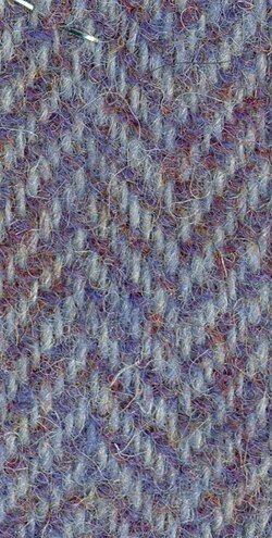 Genuine Harris Tweed must be handwoven by islanders in their homes in which islands?