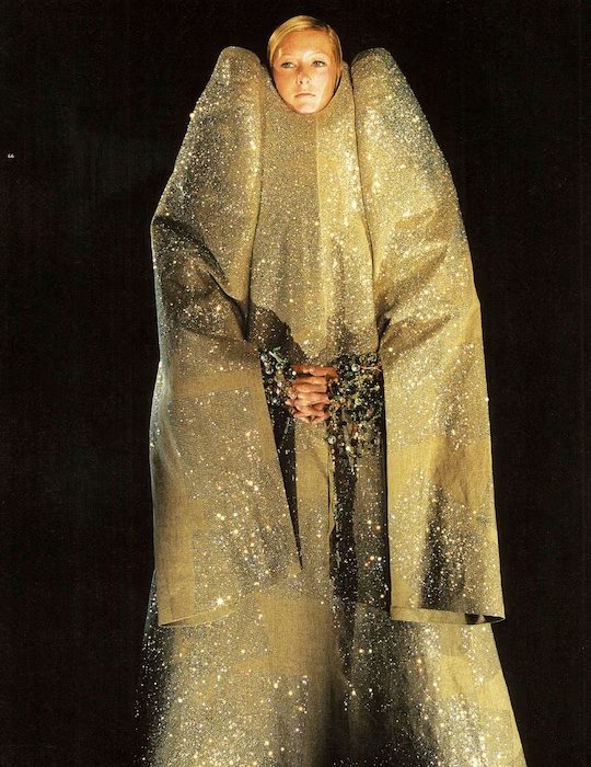How many layers of clothes is model Maggie Rizer wearing in this picture?
